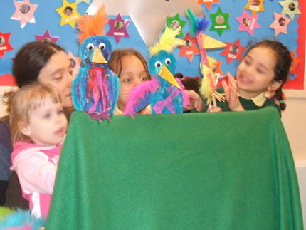 putting on a puppet show in the workshop
